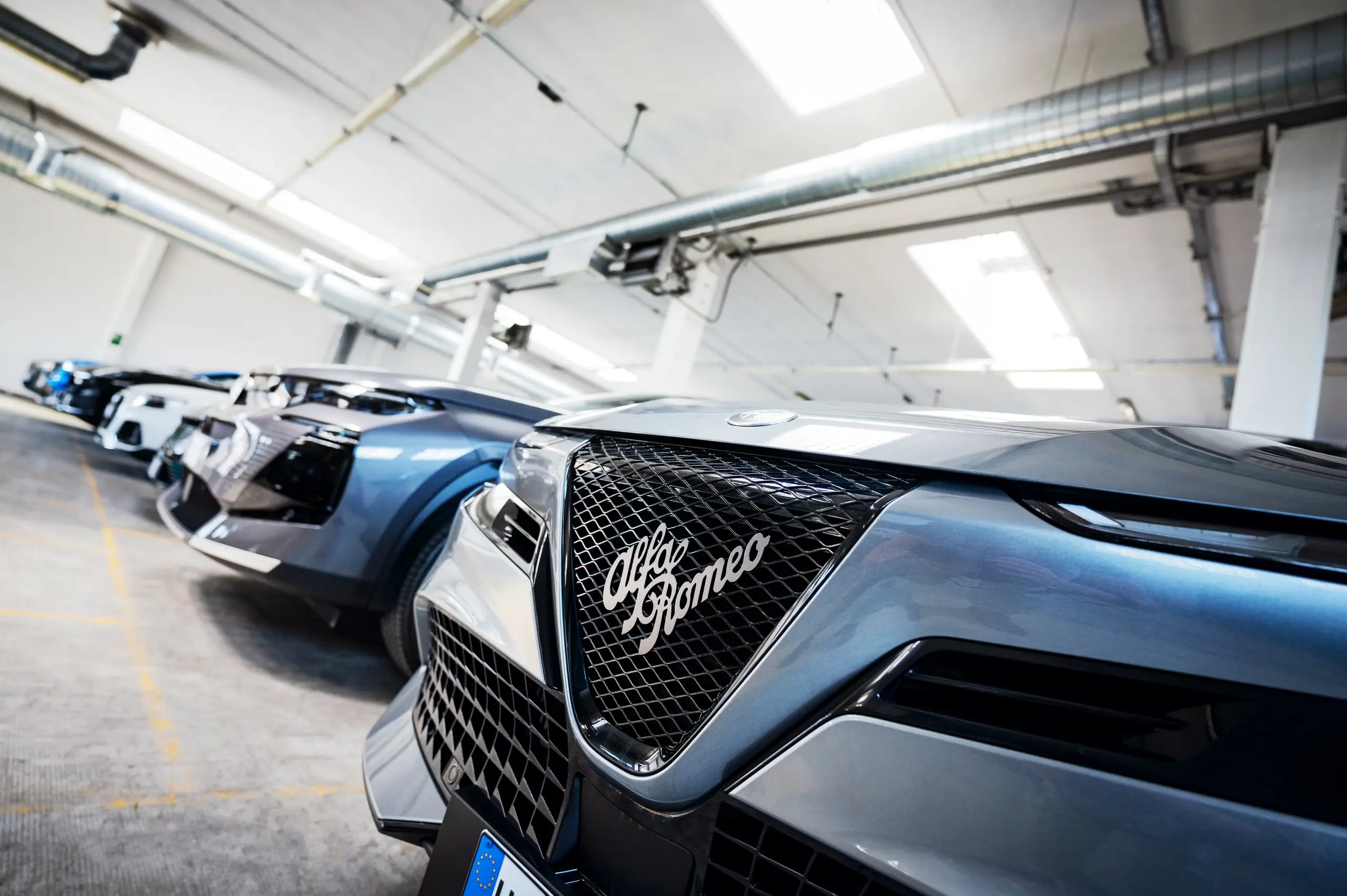 Le auto a noleggio Dionisi in fila nell’autorimessa di Torino · Dionisi Rent&Service · dionisigroup.it